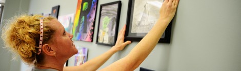 Le Hale hangs student are for show on First Friday